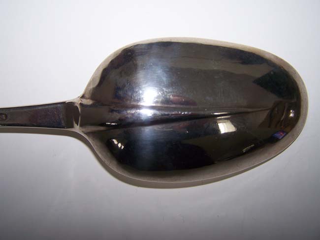 An English Queen Anne Period Silver Basting Spoon made in London in 1712 having a crest depicting a Bat. — image 5